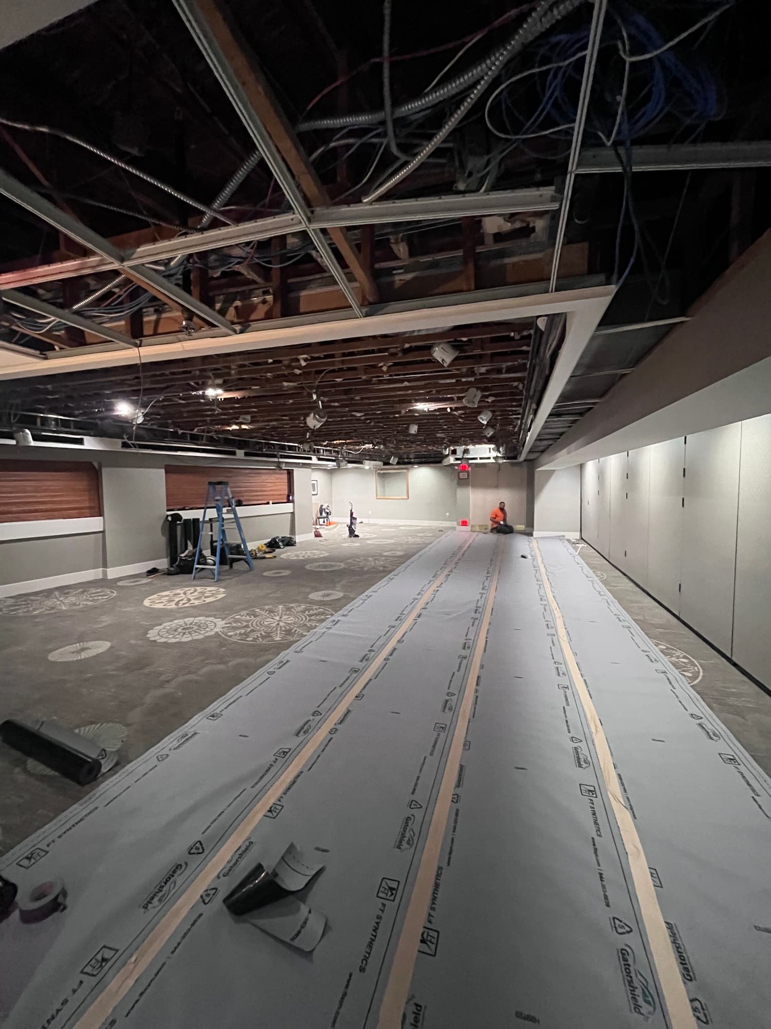 Gutted commercial ceiling during a full interior demolition
